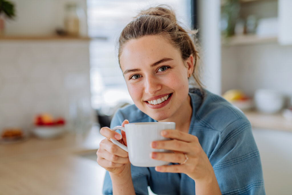 young women enjyoing a cup of coffee or tea or suitable for hajoona balance